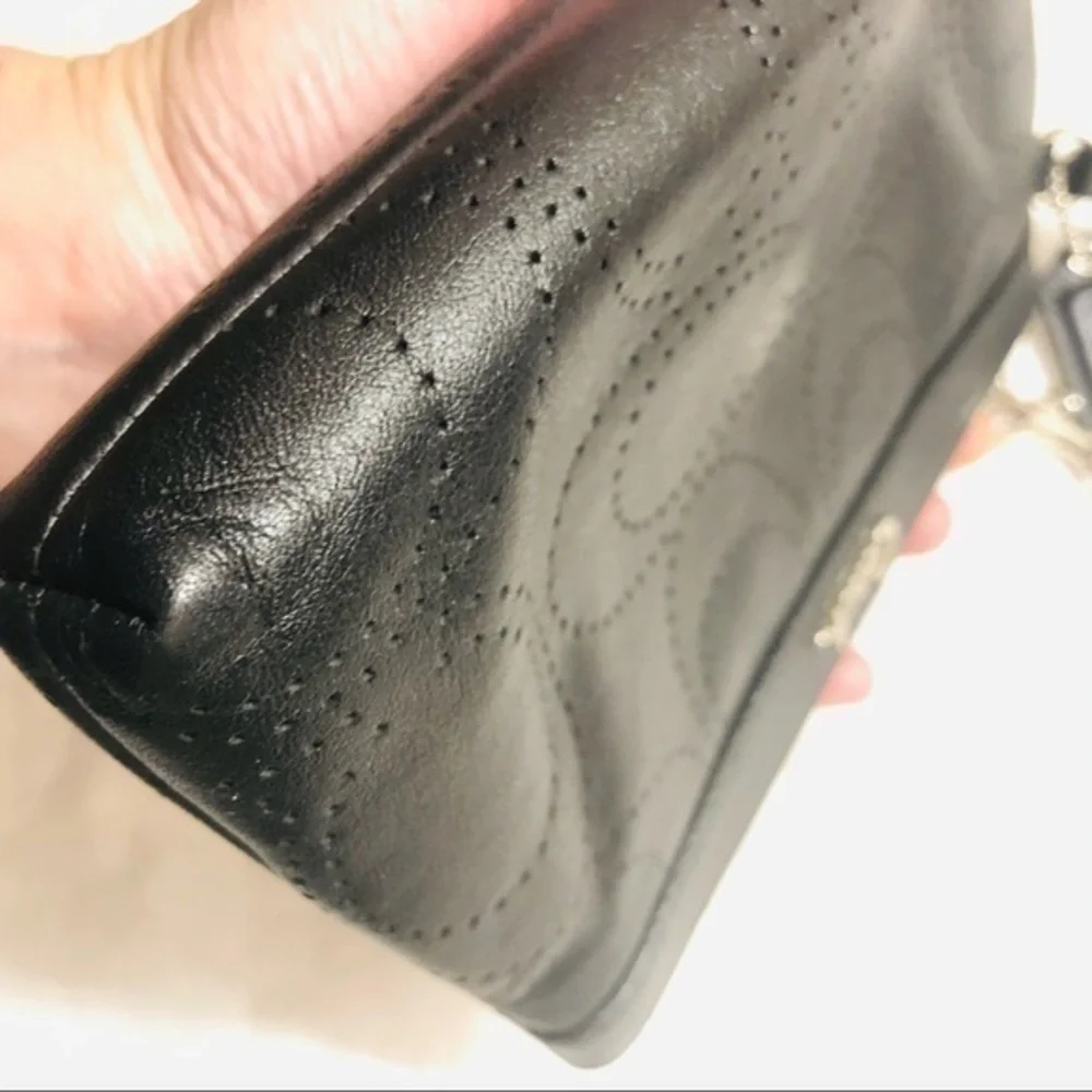 Coach signature perforated c wristlet bag